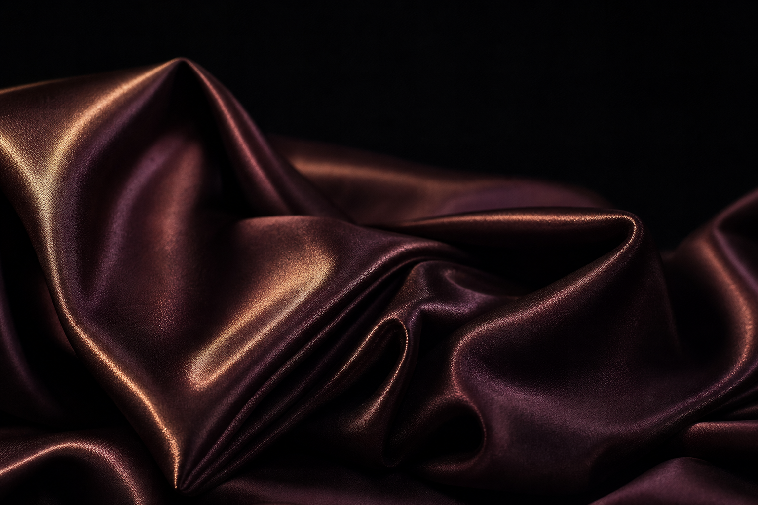 Silk fabric drape lit in gold — body-to-body massage Bangkok